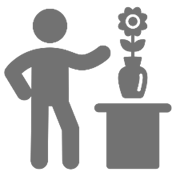 Icon person pointing to flowers on Table