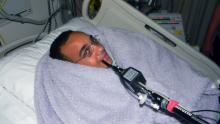 Drew Clayborn in a hospital bed