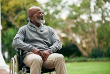 man sitting in wheelchair